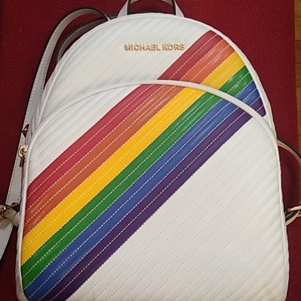 Authenticatic Michael Kors leather back pack.